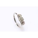 18 carat white gold and platinum three stone diamond ring, approximate total diamond weight 1 carat,