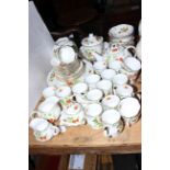 Virginia Strawberry pattern part tea and dinner service by Ringtons, approximately 55 pieces.