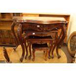 Serpentine front console table and similar nest of three tables.