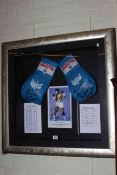 Large framed autographed boxing gloves, picture and career record signed by John Conteh.