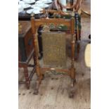 Shoolbred oak and brass mounted dinner gong and beater, circa 1890, 99cm high by 50cm wide.