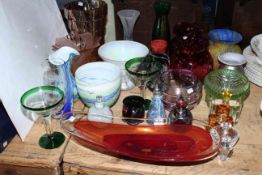 Collection of coloured glass and shades including perfume bottles, Saturn red glass bowl, Alum Bay.