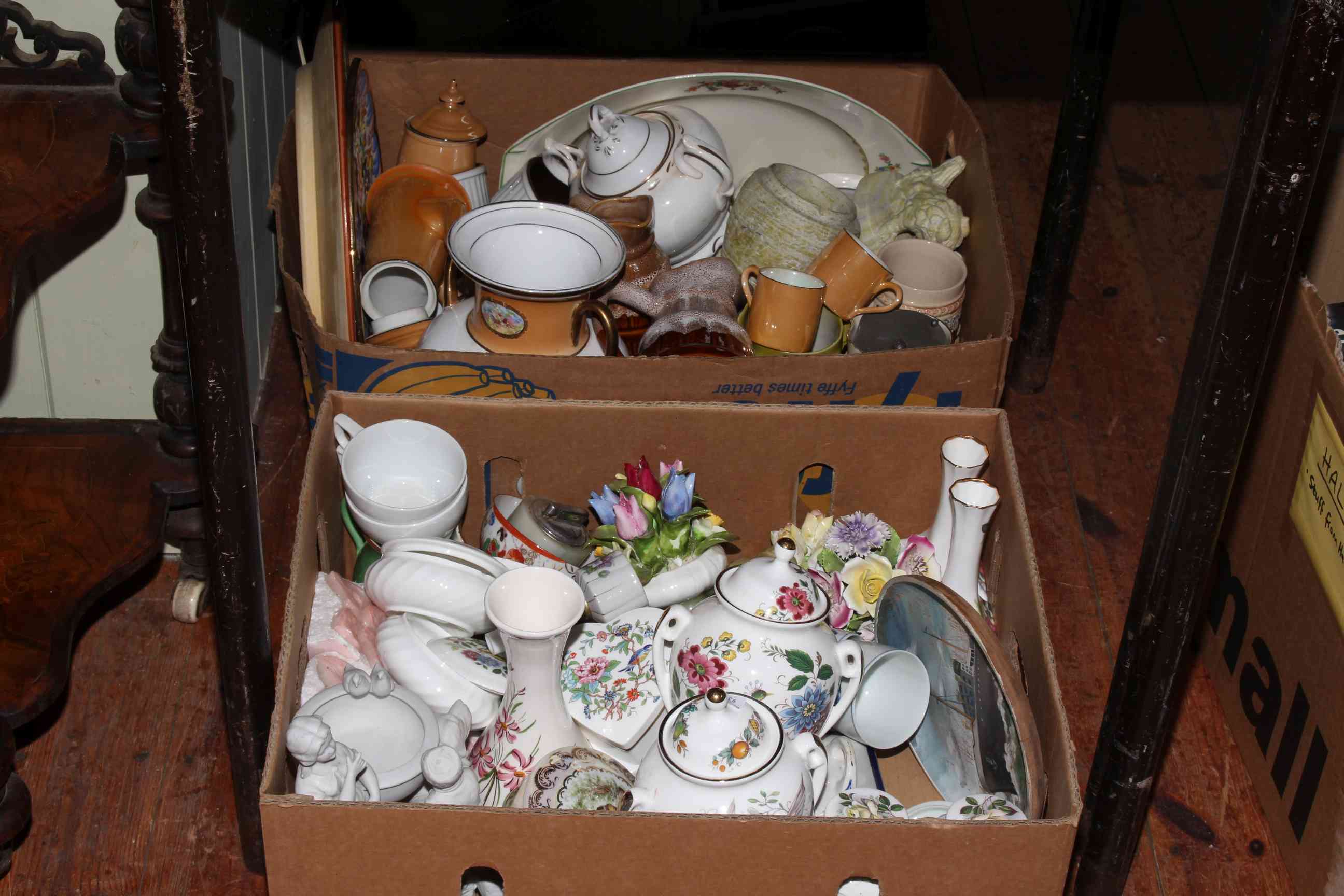 Nine boxes of assorted china, figure teapots, tableware, Studio Pottery, etc.