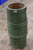 Green painted barrel stick stand, 67cm high by 28cm diameter.