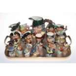 Collection of nine Royal Doulton character jugs including Pied Piper and Ugly Duchess,
