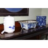 Three pieces of Chinese blue and white, jar and cover, square vase and planter.