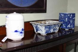 Three pieces of Chinese blue and white, jar and cover, square vase and planter.