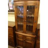 Bevan Funnell Ltd oak leaded glazed four door standing corner cabinet and similar Bevan Funnell Ltd