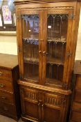 Bevan Funnell Ltd oak leaded glazed four door standing corner cabinet and similar Bevan Funnell Ltd