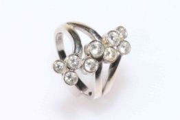 14k white gold and nine stone diamond ring, size P.