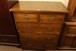 Early 20th century oak chest of two short above three long drawers,