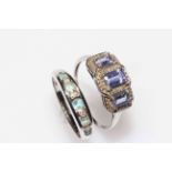 Two gem set white gold rings.