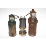 Three miners lamps including Oldham 900-4090.