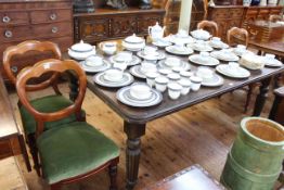 Late Victorian oak extending dining table, two leaves and winder raised on reeded legs,