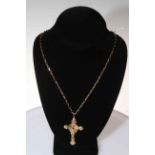 9 carat gold crucifix, 6cm drop, with 9 carat gold chain necklace.