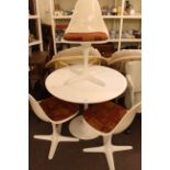 Vintage Arkana Tulip table and three swivel chairs.