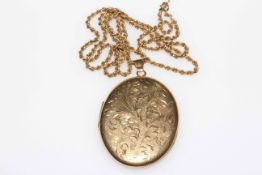 9 carat gold oval locket, 55mm by 45mm, with 9 carat gold rope twist necklace.