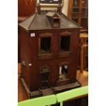 Late Victorian two storey dolls house with later furnishings.