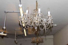 Eight branch lustre drop ceiling light and five branch gilt metal and lustre drop ceiling light.