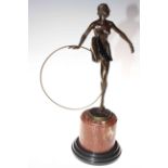 Art Deco style bronze of dancing hoop girl on marble base, 47cm high.