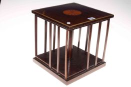 Inlaid mahogany table top revolving bookcase, 29cm high by 28cm by 28cm.