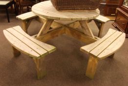 Circular combination patio table and bench set.