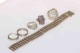 9 carat gold bracelet (damaged) and five silver rings.