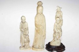 Three late 19th Century Japanese walrus ivory okimonos, tallest 25cm.