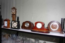 Six mantel clocks including mahogany inlaid, Art Deco style, Griffiths and Hutton.