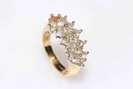 18 carat gold and diamond set ring having sixteen square cut diamonds, size Q.