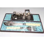 Cased fish servers, cased silver handled tea knives and model of horse drawn carriage (3).