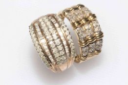 Four 9 carat gold multi-stone diamond rings.