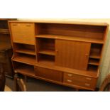 Elliotts teak highboard, 142cm high by 182cm wide by 42cm deep.