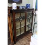 Early 20th Century mahogany two door china cabinet on ball and claw feet,