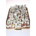Collection of crested china including monuments, chairs, gramophones, etc.