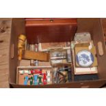 Box of collectables including cigar and coin boxes, model vehicles, two Mauchline Ware napkin rings,