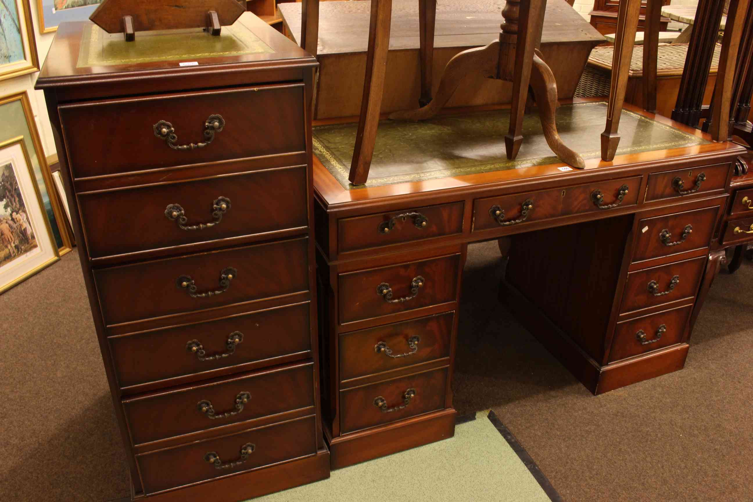 Mahogany seven drawer pedestal desk, 77cm high by 121cm wide by 61cm deep,