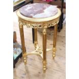 Pair circular gilt and inset marble top tables, 75cm high by 48cm diameter.