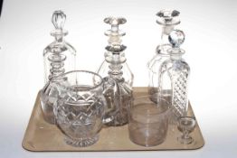 Six assorted glass decanters, water jug, eye wash and wine glass rinser.