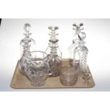 Six assorted glass decanters, water jug, eye wash and wine glass rinser.