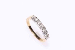 18 carat gold seven stone diamond ring, size P.