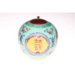 Large Chinese ginger jar with turned wood cover.