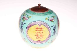 Large Chinese ginger jar with turned wood cover.