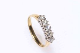 Five stone diamond ring set in 18 carat gold, size R.