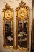 Pair large arched top gilt framed rectangular bevelled wall mirrors with classical maiden panels,