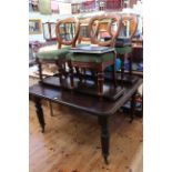 Late Victorian oak extending dining table, two leaves and winder raised on reeded legs,