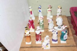 Thirteen Royal Doulton Kate Greenaway figures.