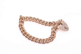 9 carat gold chain link bracelet with padlock fastener.