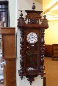 Victorian walnut cased Vienna wall clock.