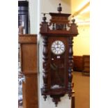 Victorian walnut cased Vienna wall clock.